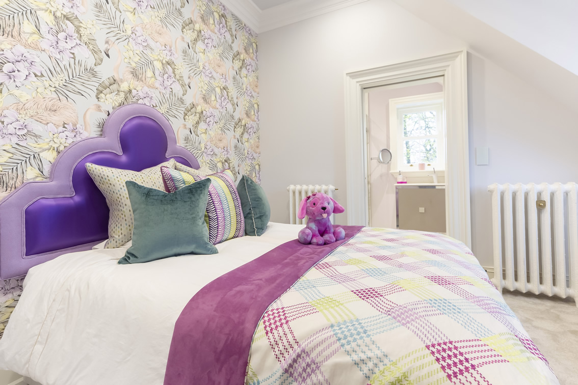 Bed with Purple Headboard